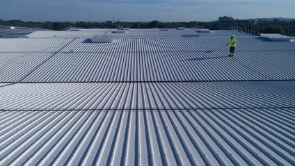 Simple roofing with special coating HDX-55 both faces to a compost industry in Tarascon (France)