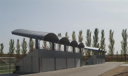Curved Roofing in a football stands in the municipal sports complex in Carbajosa de la Sagrada (Salamanca) -Spain